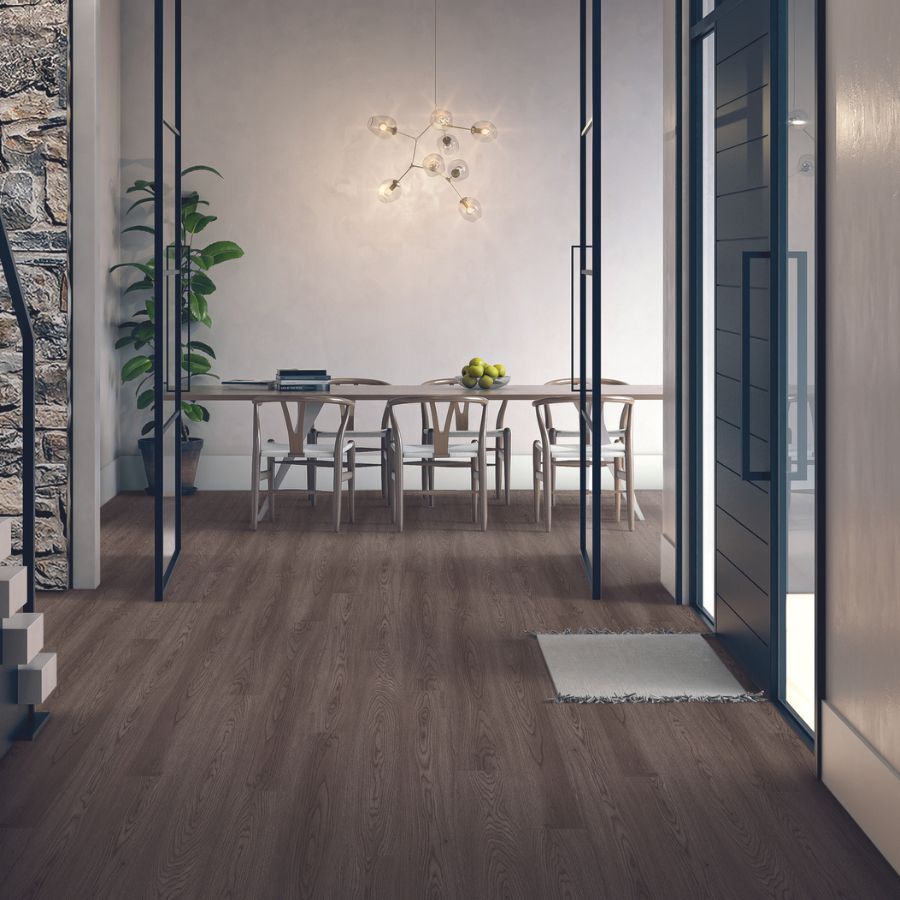 Laminate flooring in dining room, wood table, light